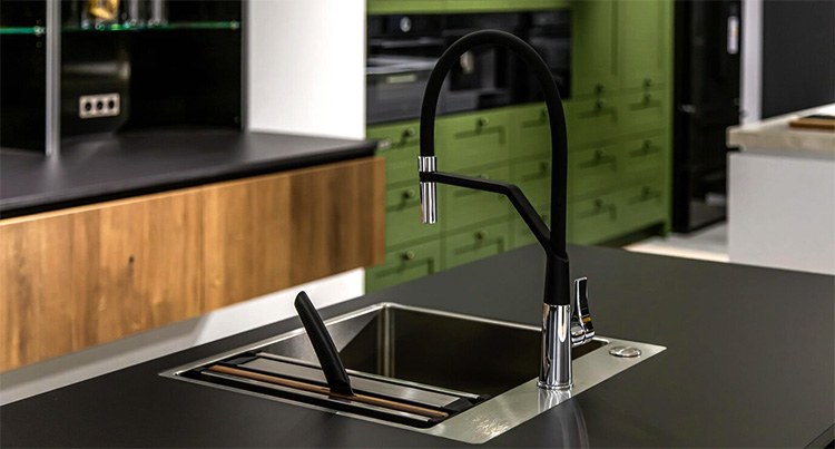 Kitchen with black top and sink